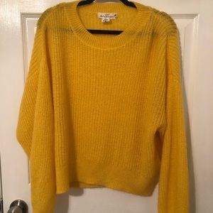 yellow sweater